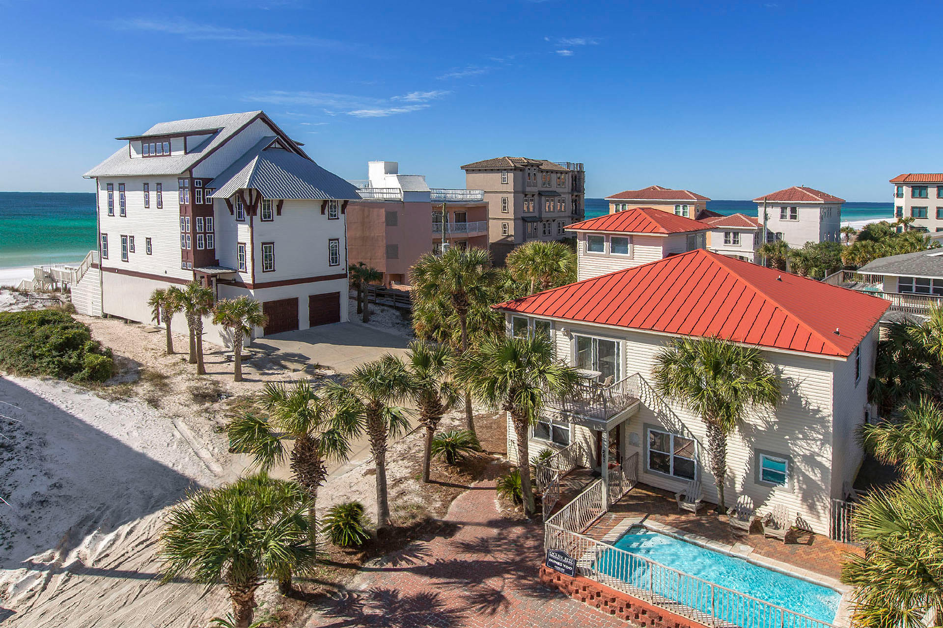 Positioned one row back from the gulf this 6 bedroom-5 bath home checks all the boxes. Updates in 2020 include a new roof, tiled showers, new bathroom cabinets, quartz tops, backsplash, interior paint, lighting, and some new furnishings. Private pool is right outside your door, the beach access is steps away and no home owners association fees. First floor offers kitchen, dining, 1 master suite and 2 bunk rooms. The second floor has a spacious light filled family room with gulf views, 2 master suites and 1 additional guest room with a hallway bath. Tower room has a sleeper sofa and could be used as an office also.2021 rentals of $141K, remaining bookings at time of contract must be honored by buyers unless the rental company can move the bookings.
