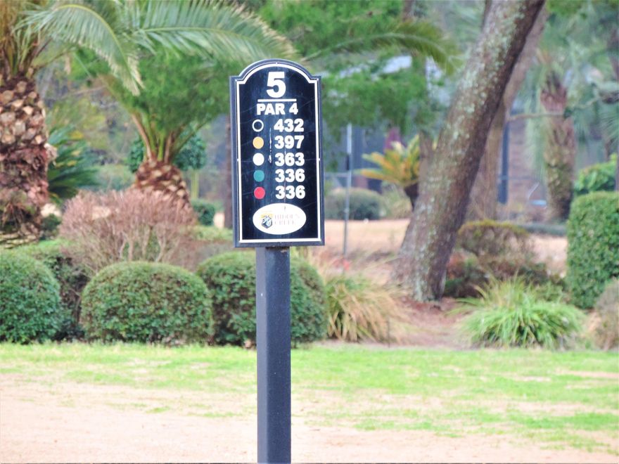 Perfect Hidden Creek Golf Course lot. Wooded, level and located right before the 5th tee. Bring your builder and dream home plans. Holley by the Sea community has 3 swimming pools, 8 tennis courts, full work out area, etc. Located a short drive from the Gulf Beaches and a short drive to military bases.