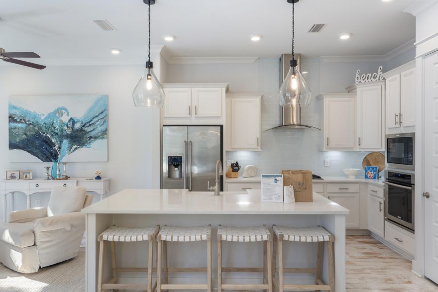 Freshly styled in October 2025 by Tammy Mathews Interiors, this 3BR/2.5BA townhome in Prominence on 30A radiates a renewed coastal energy with fresh paint, new window treatments and new furniture pieces. The open layout connects a chef-inspired kitchen--stainless steel appliances, custom cabinetry, and a spacious island--to airy living spaces with hardwood floors and natural light. The primary suite offers a serene retreat, while guest rooms provide comfort and style. Outdoors, enjoy al fresco dining amid lush community landscaping. Neighborhood amenities include a resort-style pool, fitness center, and green spaces, with HOA coverage including home insurance and security. Perfectly positioned between Rosemary Beach and Seaside, this home captures the essence of 30A living. Just across the street, The Big Chill (The Hub) brings vibrant nightlife, dining options, and boutique shopping to your doorstep. The dedicated beach access via Deer Lake State Park is only half a mile away, offering the pristine sands and turquoise waters that make this area world-renowned. 296 Milestone Drive Unit A reflects quality from the freshly painted interiors to the designer furnishings that make this turnkey property truly move-in ready.
