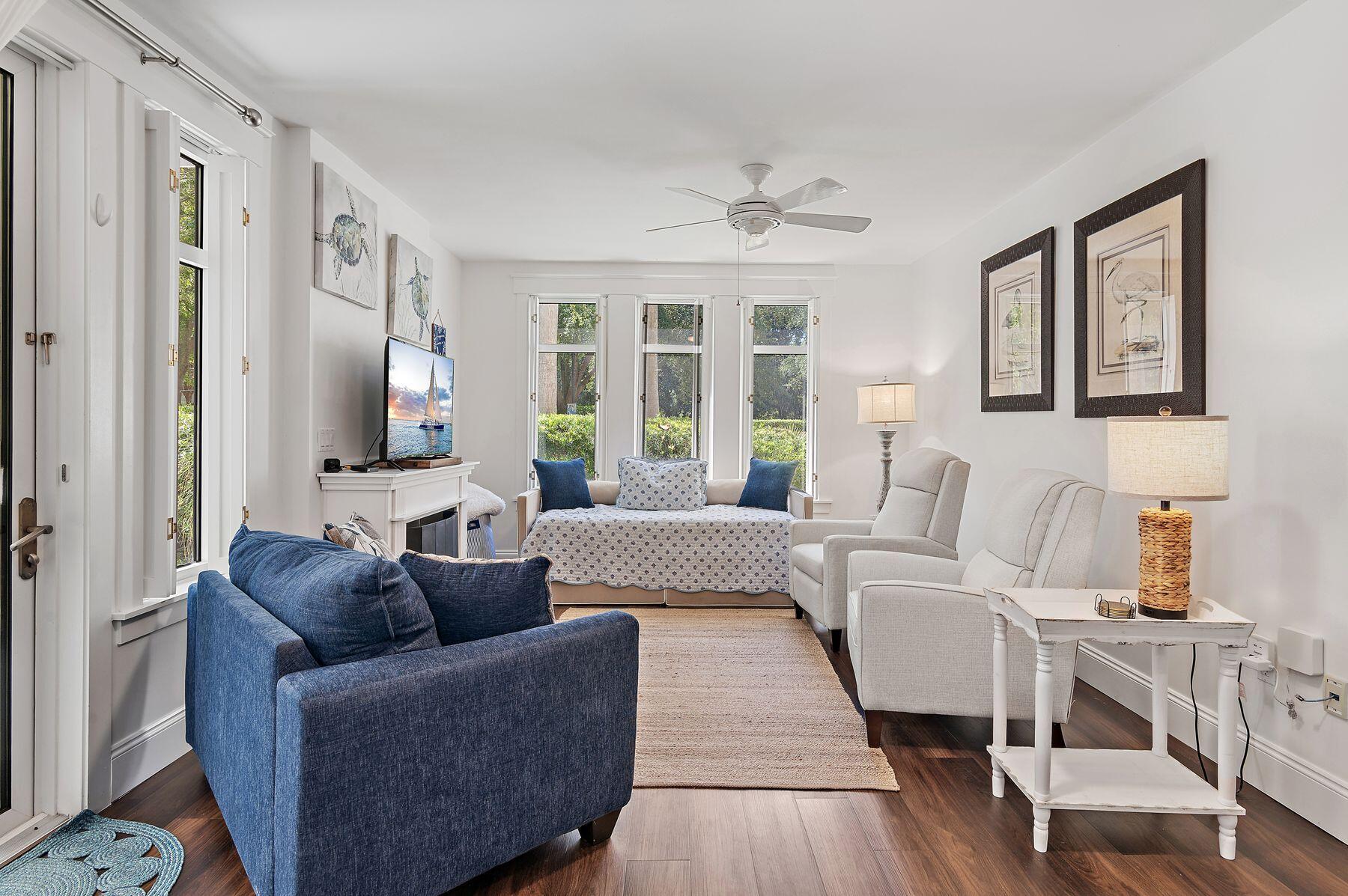 This coveted ground-floor corner residence offers a serene retreat in one of the most desirable settings. A private courtyard-facing patio creates the perfect spot for morning coffee, evening wine, or easy access for pets after a stroll through the Village. Thoughtful upgrades include a new HVAC, water heater, appliances, and custom kitchen cabinets topped with quartz. Luxury LVP flooring, custom window treatments, and new furnishings enhance comfort and style. Inside, the bedroom feels like a boutique suite, framed by a wall of built-in bookshelves and accented by elegant shutters throughout. Owners enjoy exclusive access to the waterfront Solstice Club, a private gathering place with sunset views, screened porches, outdoor grilling areas, and a fitness center. Located at the quiet end of the Village of Baytowne Wharf, this residence offers the best of both worlds- peaceful surroundings with quick access to shopping, dining, and entertainment just steps away. It's a turnkey retreat designed for effortless living. All of this, and situated within the gates of Sandestin Golf and Beach Resort, with access to the emerald waters of the Gulf of Mexico beaches, world-class golf courses, tennis and pickleball courts, a full-service marina, miles of walking trails and so much more.