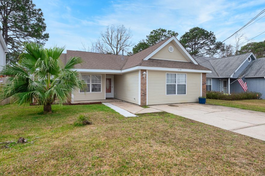 Centrally located in the heart of Fort Walton Beach this home offers an open concept floor plan as you walk in to the left is kitchen and dining, which overlooks the living area. The home also features a bonus flex room, primary bedroom with double sinks, and more! Home also has a well sized fenced backyard and shed! Seller is offering a flooring allowance to upgrade carpet in primary bedroom and flex room.