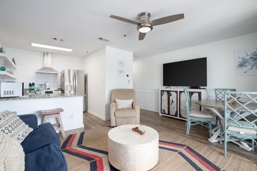 Gulf & Pool Views and easy direct access to the Beaches of the Gulf Of Mexico!!!  Look no further than this renovated 1-Bedroom/1-Bathroom Condo Unit with Hallway Bunks and a Pull-Out Couch that sleeps 6 Guests. There is newer wood flooring, no carpet and recently installed Shiplap Walls in the Living Room and Master Bedroom.  The Master Bathroom is renovated with Walk-In Shower and Vanity. The Unit has upgraded furnishings & appliances and will be delivered AS IS Furnished and Rental Ready. The Patio Furniture is updated. Washer & Dryer in Unit. The Grand Caribbean West Building is right across the street from the Beach/Gulf Access. Right in the middle of Crystal Beach, one of the most desired areas on the Emerald Coast.