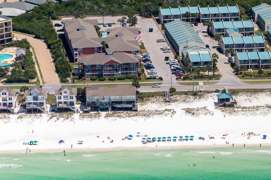 RARE FIND! 1st Floor Corner Unit w/ NEW commercial grade Floors! The spotlight has stopped here! This gorgeous beach condo  overlooks one of the 2 pools, is 100ft from the second heated pool and hot tub. Enjoy days at the deeded beach w/ private gate access, or spend the day away at the pool. This unit has it all! Complete and TURNKEY ready, fully-furnished unit with hallway bunks + New HVAC! Fully updated kitchen, spacious living and dining area + more! This unit sleeps 6 and leaves NOTHING to be desired. Gulf View Condominiums is a complex of vacation rentals just across the street from Miramar Beach. Featuring private beach, two pools (one heated), a jacuzzi and BBQ grilling area, all surrounded by immaculate landscaping, LOW HOA! Your friends, family and vacationing guests will LOVE it