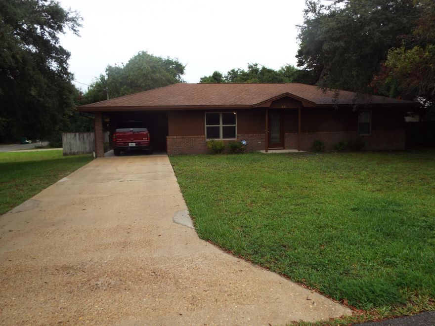 CUTE, CUTE HOME THAT HAS BEEN KEPT LIKE NEW WITH AMAZING DETACHED 24X30 GARAGE OR MAN CAVE. 3 BD, 2BA WITH EXTRA ROOM FOR OFFICE OR ADD CLOSET AND YOUR HAVE ANOTHER BEDROOM.THIS HOME HAD NEW HVAC INSTALLED JULY, 2016, FOLKER WINDOWS AND DOORS WITH WARRANTY. ALL APPLIANCE STAY WHICH INCLUDE FRONT LOADING WASHER & DRYER, DOUBLE DOOR REFRIG WITH FREEZER ON BOTTOM. KITCHEN HAS GRANITE & TUMBLED STONE BACKSPLASH. BATHROOMS HAVE BEEN UPDATED WITH GRANITE AND BATH FITTERS TILED TUBS/SHOWERS. NO CARPET IN HOME ONLY TILE & WOOD. THIS CORNER LOT IS GREAT WITH VACANT LOT BEHIND AND LARGE ENOUGH FOR POOL IF DESIRED. SCREENED PORCH LEADS TO GARAGE & YARD. CARPORT OFF KITCHEN. THE GARAGE WAS BUILT IN 2004, HAS 9 FOOT CEILINGS, 8 FOOT DOUBLE STORM GARAGE DOOR WITH INSULATED WALLS WITH FLOORED ATTIC