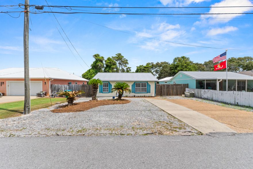 21714 Pompano Ave, Panama City Beach, FL 32413 2 Bed | 1 Bath | Fully Furnished | Turnkey Rental Ready Beautifully updated and fully furnished, this turnkey coastal retreat is located in a quiet, family-friendly neighborhood just minutes from the beach. The home features plantation shutters, updated kitchen cabinetry (2023), and newer stainless steel appliances including a dishwasher and microwave (2023), and fridge and stove (2019). Fresh furniture (2024) and a bathroom refresh (2025) make the interior feel like new. Smart upgrades include a Nest thermostat, August keypad lock, and outdoor security camera -- ideal for rental automation. Recent improvements include a new roof (2023), hot water tank (2023), fence (2022), and back porch with outdoor furniture (2022). Also includes a front-lo ad washer/dryer (2019). Perfect as a primary home, vacation property, or short-term rental fully stocked, stylish, and ready to enjoy or list Day One.