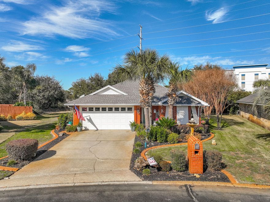 Nestled within the charming community of Seaspray, this exquisite property boasts modern upgrades throughout, offering a perfect blend of style and functionality. With a spacious layout encompassing three bedrooms and two bathrooms, this 1570 square foot home radiates comfort and elegance. The renovated kitchen, bathrooms, lighting, and new windows enhance the overall appeal. Step outside to an expansive patio area, complete with a luxurious hot tub for relaxation. Additionally, the new roof installed in 2019 provides peace of mind. The option for short-term rentals, access to a community pool, and deeded beach access with parking further elevate the allure of this hidden gem.