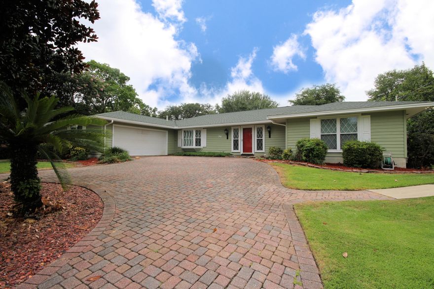 MOVE-IN READY!Located in highly desirable Lake Lorraine neighborhood. This 3 Bedroom 3 Bathroom is located directly on 7th hole fairway SHALIMAR POINTE Golf Course.Arriving on the Brick Paver circular driveway leads you right to the Front door as you walk in thru the Stone Foyer which leads into the Bright and Light Open Concept Living Area with Fireplace surrounded with NEW CARPETING in ALL directions and also New Vinyl Plank. Crown Molding throughout, Spanish Lace texture painted walls, Many Upgrades Throughout! Hurricane Shutters in Garage for Windows. Beautiful Landscaping surrounds this home.Conveniently each Bedroom has its own Bathroom. This Home will not Last long, so schedule your showing today before its gone! Now Interviewing New Homeowners!