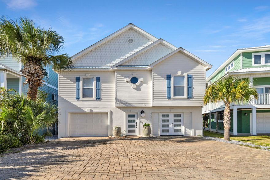 Stunning Waterfront Home with Gulf Access and Deep Water Boating Amenities.  Don't miss this incredible opportunity to own a newly renovated waterfront retreat with direct access to the Gulf! Situated in a secluded, gated community, this home is a boater's paradise, complete with a deep-water boat slip and boathouse.  Step outside to enjoy Florida's fabulous weather on two oversized, southern-style screened porches--perfect for entertaining family and friends. Inside, the home features exquisite finishes, including light sand-colored quartz countertops in the kitchen and bathrooms, complemented by immaculate white cabinetry and modern gold hardware for a clean, sophisticated look. Elegant, opaque white tiled showers and a convenient outdoor shower provide multiple options to refresh after a day at the beach or on the water. Pale wide-plank wood tile flooring runs seamlessly throughout the home, adding warmth against the charming white shiplap walls. Modern, sleek windows and doors introduce a touch of metropolitan flair, while designer lighting mimics the natural outdoor ambiance.  With two separate living areasone downstairs and one upstairsthis home offers the flexibility for kids to hang out downstairs while adults relax and socialize upstairs.  Conveniently located less than 10 miles from Pier Park, you'll have access to excellent dining, shopping, and entertainment. Additional highlights include a climate-controlled garage, making this home as functional as it is beautiful.This exceptional waterfront property truly has it all. Schedule your private tour today and make it your coastal oasis!