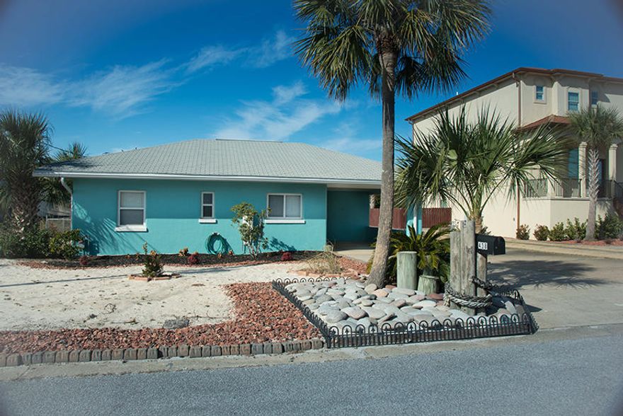 Unique cottage on Okaloosa Island with waterviews of sound from home and waterviews of gulf from back yard . Public access to both Gulf and Sound from right behind back yard. Large detached 2 car garage and a carport attached to house.  Kitchen has Corian counter tops and breakfast bar. Living room has original terrazzo flooring and tongue and groove ceilings throughout.  Huge open deck outside in back of home.  Outside shower. Oversized parking for RV, boat wave runners and cars. New roof in 2020!