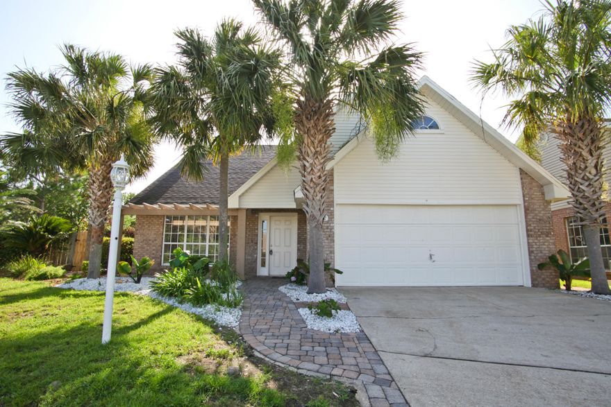 Beautiful home is move-in ready. From the easy to care for tile flooring to the upgraded kitchen cabinets this home has many features you don't want to miss. Four bedrooms 2.5 Baths with downstairs Master Suite. Inviting in ground pool, kitchen with granite countertops, kitchen backsplash, Stainless Steel Appliances and tile in kitchen. Large spacious bedrooms with master bedroom suite downstairs. Loft area upstairs can accommodate an office, playroom, TV room, etc. Beautiful inground pool will provide many hours of fun in the sun. And it's not very far from the beaches, shopping or schools.