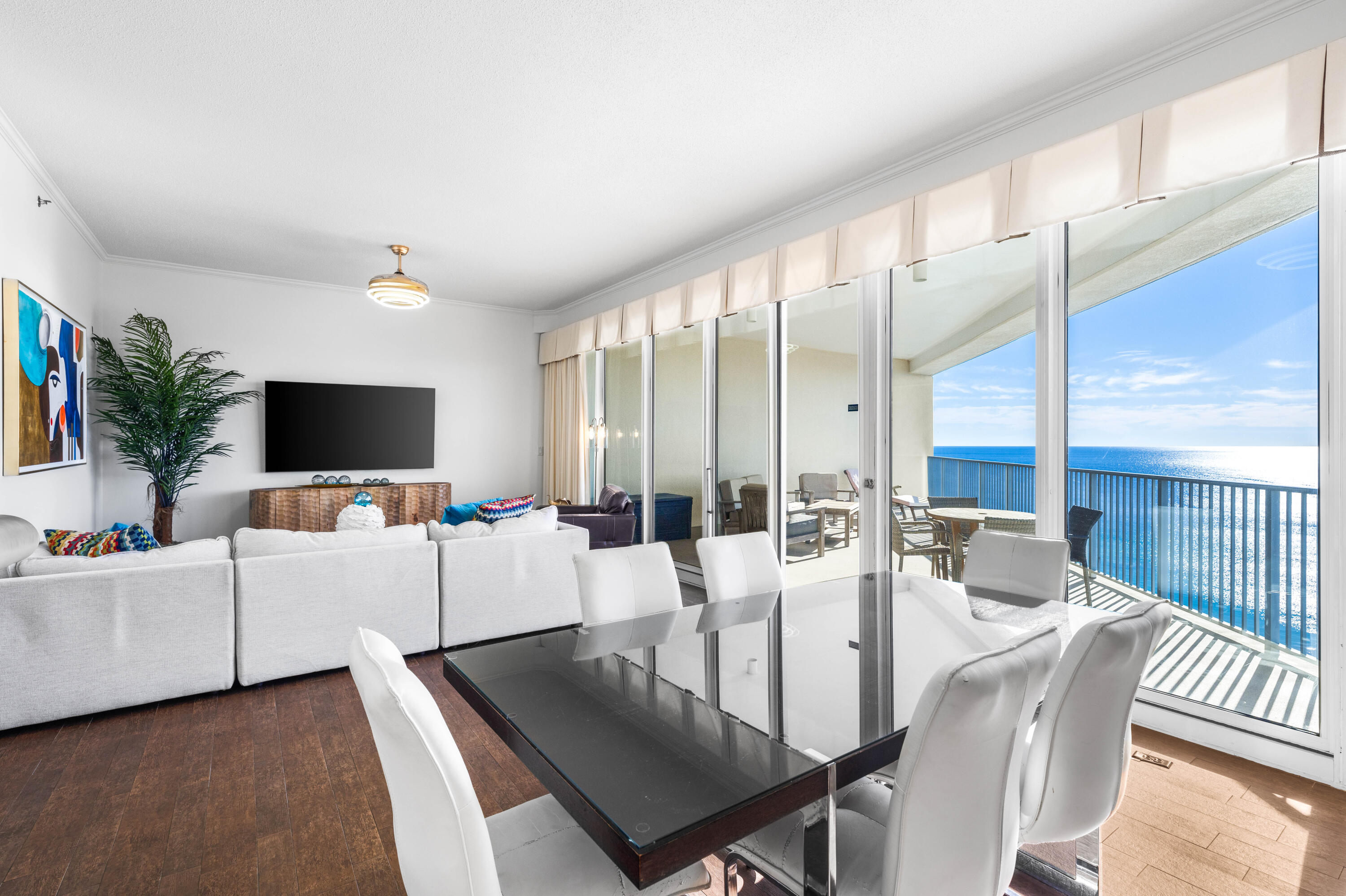 New!! interior paint, furniture, accessories and artwork! This stunning penthouse condo with 11 foot ceilings invites you to indulge in the beauty of the Gulf waters Bay & Marina from the comfort of your own oversized balcony. With its panoramic views, this space becomes a sanctuary for enjoying sunsets and entertaining guests in style. Inside, a spacious living room with floor to ceiling glass & the well-appointed kitchen and dining area with all new lighting. The 2 bedrooms, each boasting en-suite baths, offer a perfect blend of privacy and convenience. Exclusive access to private tennis, pickleball, shuffleboard, & basketball courts with 3 dedicated pickleball courts for Tides building.. Enjoy one of two pools or indulge in relaxation in the beachside hot tub. Don't miss the poolside bar & grill and the option to join the resort's state of the art fitness center