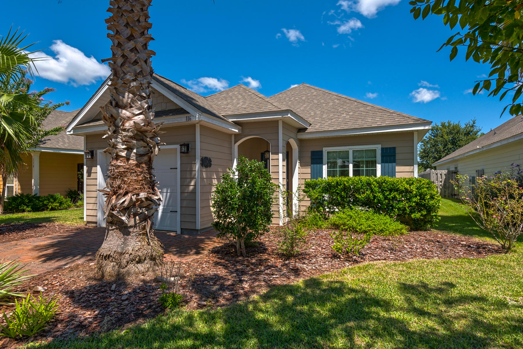 Imagine your beach life without the beach front price! Turtle Cove is a wonderfully manicured neighborhood just 5 minutes from the beach, and less than 10 minutes to 30A or Pier Park. This darling home is situated along a community greenbelt offering ample privacy. Perfect as a starter home or even for someone looking to downsize, this well maintained property includes 3 bedrooms, 2 baths, a single car garage, and a storage building out back. All appliances will convey including the washer & dryer. Turtle Cove offers beautiful amenities including tennis courts, a clubhouse with a lakeside pool and hot tub, a pier with access to Lake Powell, one of the rare Coastal Dune Lakes, and lovely green spaces throughout the neighborhood.