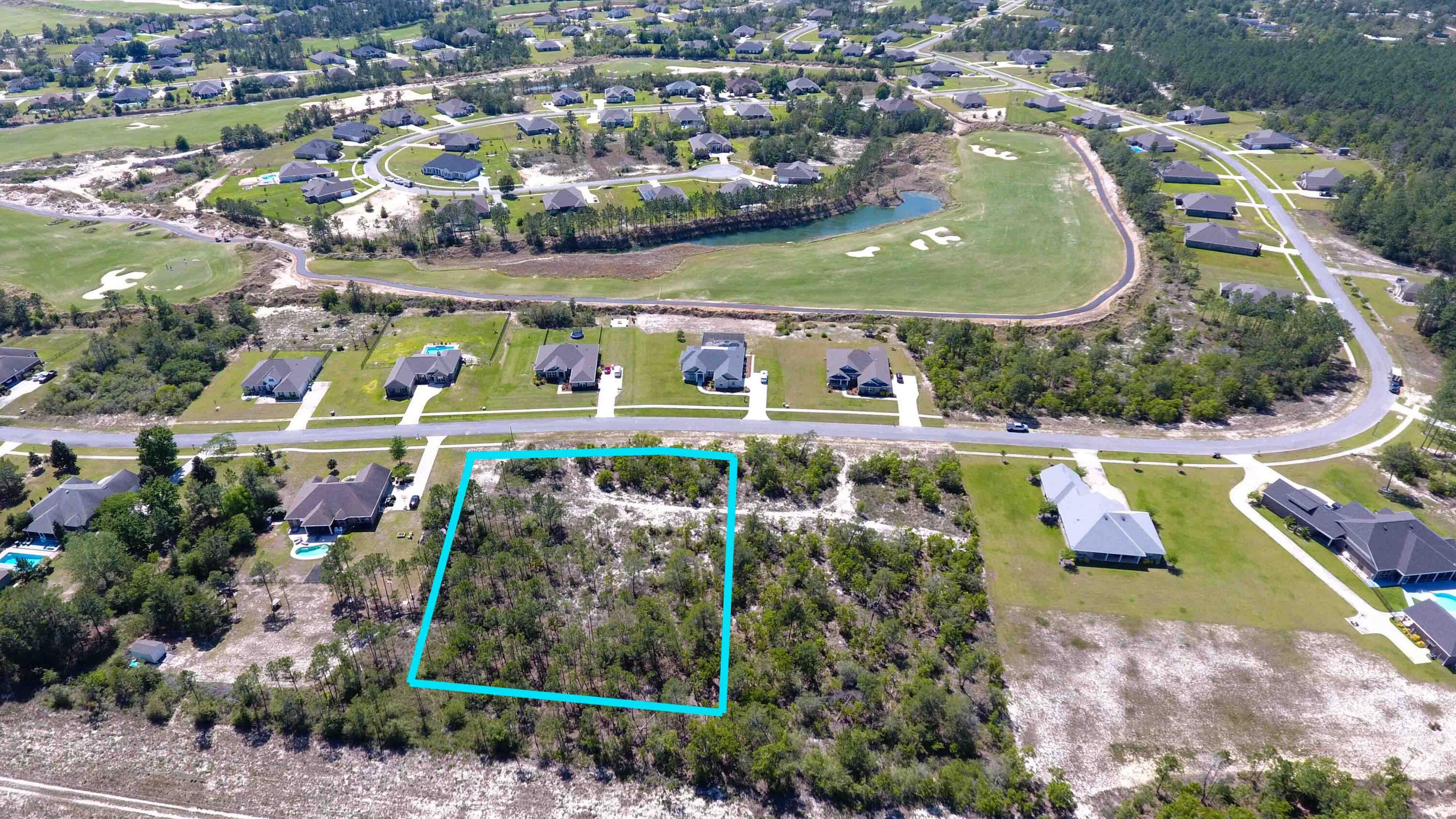 This expansive 1.37-acre lot provides abundant privacy, making it an ideal site for crafting your custom dream home. Located within Windswept Estates, a picturesque gated golf community, it offers generous size lots encircling the prestigious 18-hole Windswept Dunes Golf Club. Just a short 20-minute drive south are the stunning white sand beaches and crystal-clear waters of Santa Rosa Beach. Residents enjoy an array of amenities including a large community pool, clubhouse, golf, tennis, basketball, playground, and nature trails. There are also plenty of neighborhood events that residents can participate in to stay connected in the community.