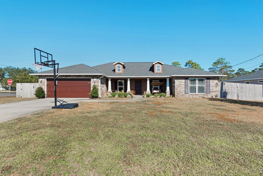The one you've been waiting for is here! This gorgeous home is less than 5 minutes from Navarre beach, and within minutes of everything else! NO HOA!!!!! The home features a sensible floor plan with the living room and kitchen being the central point. The guest bedrooms are on the right side of the home and the primary bedroom is on the left side, with easy access to the laundry room. But that's not all folks, there's also a flex room at the front of the home as well! The lot is a corner lot, and just under half an acre, so bring your pool plans because the possibilities are endless in the backyard! Electricity is supplied by a solar panel array on the roof. Come see this home as soon as possible, it won't last long!