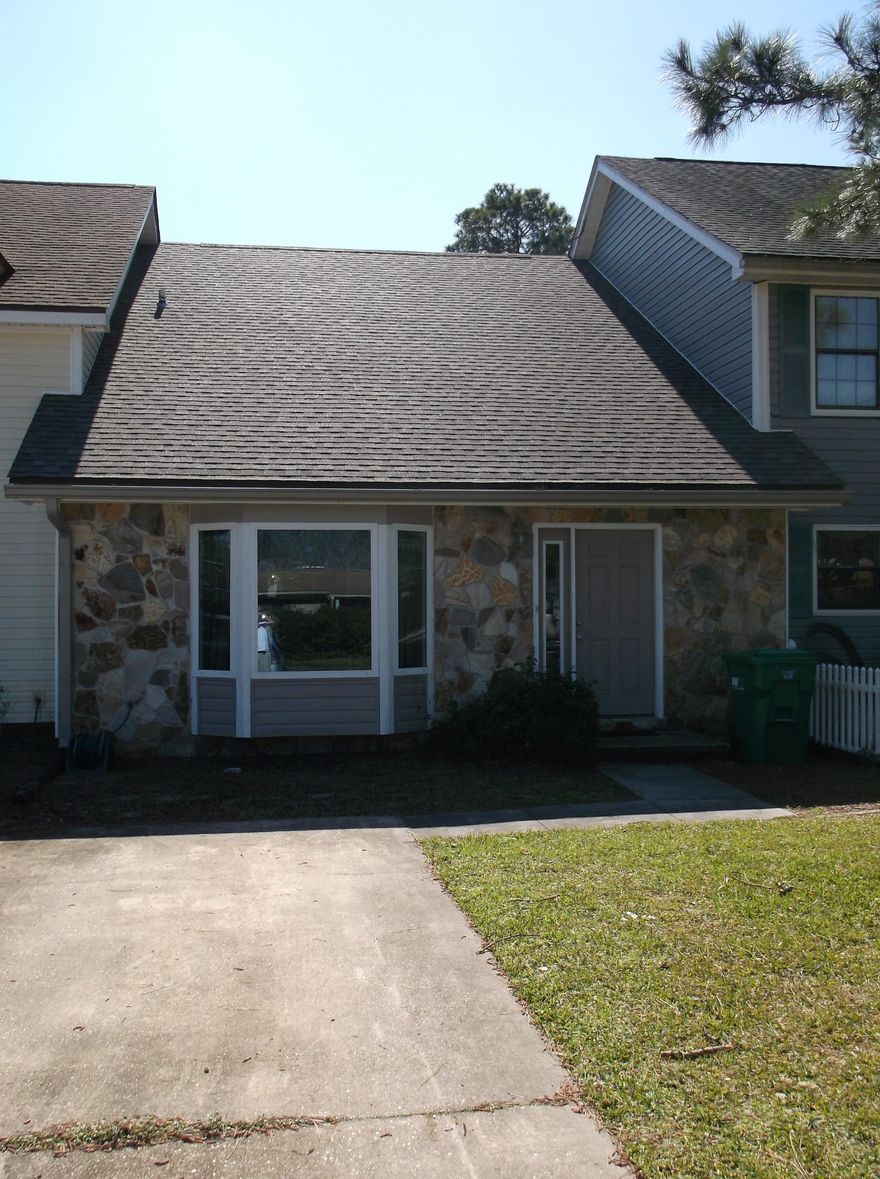 THIS TOWNHOME IS READY FOR YOU TO CALL IT HOME. NEW ROOF IN 2015, NEW VINYL SIDING 2015, NEW 18X19 WOOD DECK IN REAR 2015, KITCHEN REMODELED-GRANITE COUNTERTOPS, CABINETS, TILE FLOORS IN JULY 2005 AND LOOKS GREAT. MASTERBEDROOM ON FIRST FLOOR. FRENCH DOORS TO REAR DECK FROM KITCHEN REPLACED IN 2012 AND MASTER BEDROOM REPLACED IN 2015. SMALL LANDING AT TOP OF STAIRS. BAYWINDOW IN LIVING ROOM AND WINDOWS IN BEDROOMS WHERE REPLACED JUNE 2015. SIT ON REAR PATIO AND ENJOY THE VIEW OF THE LAKE.