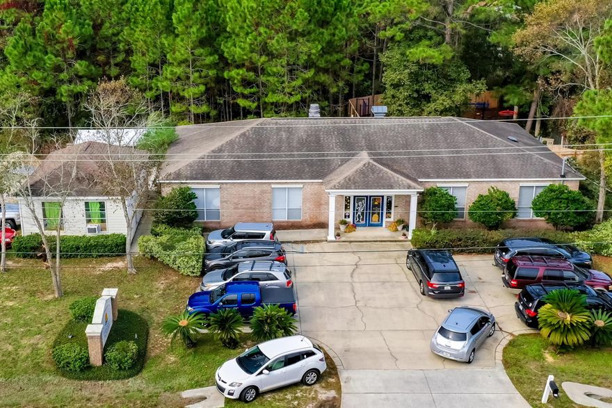 Freestanding commercial building strategically located 1/4 mile north of Sacred Heart Hospital on Mack Bayou Road, offering a multitude of viable uses, not the least of which could be office, retail, and showroom, further permissible under the site's ideal zoning classification, Coastal Center, per Walton County, Florida's Land Development Code.The parcel contains two structures, the main building measuring +/-3,400 SF, as well as a detached garage, which is now conditioned. Perhaps specific uses could cater to professional medical, medical retail, sleep center, legal, accounting, real estate, home services and products, etc. Former use was that of a homebuilder, which involved offices and showroom.