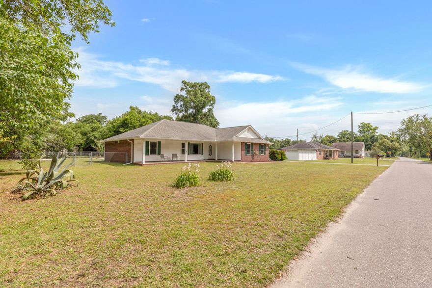 NEW ROOF will be added prior to closing!! The small community of Bagdad may be steeped in history but there's nothing old about this home. The seller has replaced windows, flooring, appliances, blinds, gutters, and even the toilets! The windows are impact resistant hurricane grade, the vinyl flooring is scratch resistant and waterproof, and the HVAC has a hospital grade filtration system. It also boasts a split floor plan, fully fenced backyard, and screened back porch. The only thing left to do is enjoy all the area has to offer. Bring your boat, jet ski's, kayaks, and fishing poles because you'll be close enough to walk to Blackwater River. Don't worry, according to Santa Rosa property appraiser you're not in a flood zone! Call today for your private showing
