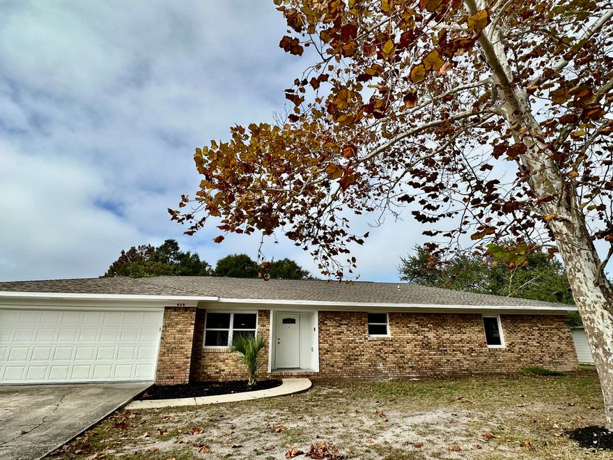 REO.  RECENTLY RENOVATED!  This Brick Home is a  rare property in the Heart of Destin which includes an approximately 700 SF Guest House!  The entire property has been FRESHLY PAINTED, NEW ROOF on MAIN HOUSE, NEW FLOORING in Guest House and much more! The MAIN HOUSE has an ALL NEW KITCHEN with Stainless Appliances and GRANITE Tops. The Main house also has a nice sized seperate OFFICE.  Guest House is Spacious and also has been renovated.  2 HVAC units 4 y/o. 2 Hot Water Heaters - 4 y/o.  Convenient to Restaurants, Shopping and Entertainment!  Call for more information!