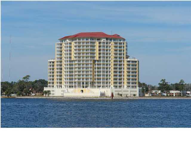 This is a center unit with panoramic views of sunsets and sunrises - Presidio Yacht Club,Fort Walton's Best Kept Secret! This is a luxury water front community with a classic Tuscany design. This location provides all residents with the most breathtaking water front views of the intracoastal waterway, the Sound, and the Gulf of Mexico. The unit is designed with upgraded kitchen & bath cabinets,granite countertops, crown molding, and 9' ceilings. The amenities include fitness center, a media center with a home theater system, heated pool & spa, storage units, garage spaces and boat slips also available. Building has a natural gas powered generator to power entire building including elevators.