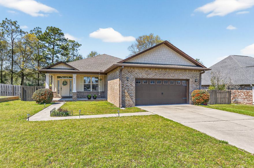 Enjoy comfortable living in this open concept home featuring 9 foot ceilings and a spacious layout. The kitchen offers granite countertops and stainless steel appliances, perfect for both everyday living and entertaining. The large primary suite features crown molding and a tray ceiling for an added sense of space. The primary bath includes a dual vanity, separate tub and shower, and a walk in closet. The fully fenced backyard features a double gate providing convenient access for boat or RV parking. A new HVAC system installed in 2025 offers added peace of mind. Located in a welcoming neighborhood with lighted streets and sidewalks. Schedule your showing today!