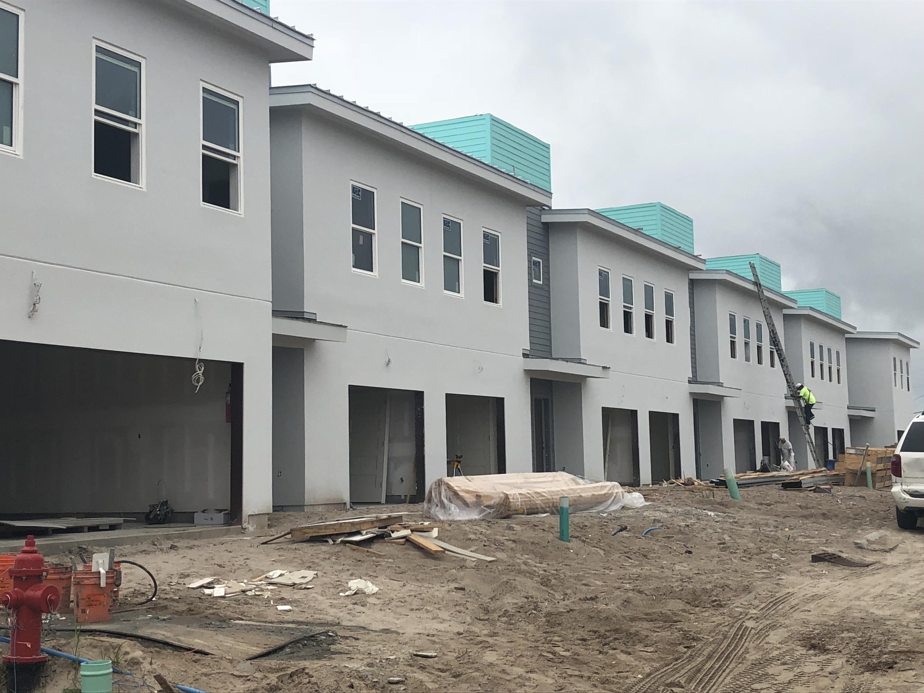 Sound Side Lofts, your new waterfront development. This project is comprised of 20 units with modern and lofted ceilings overlooking the intracoastal waterway. Situated in a quaint golf cart community, these townhomes each boast their own boat slip, garage, and upscale finishes. Located within walking distance to the world famous white sand beaches, and a short boat ride away from the world famous crab island. Sixteen 3 bedroom, 2.5 bathroom units, four 4 bedroom, 3 bathroom units, each residence includes a 28'by 12' boat slip, lofted 14' ceilings in the living area, high impact windows and doors, metal roof, granite counter tops and stainless steel appliances. Additional amenities include a private community pool with sun deck, private garage, and private dog park......