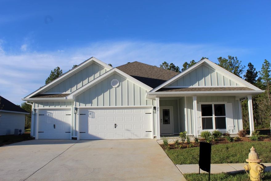 This popular Destin plan is a 4 bed, 3 bath, 3 car garage home in Hammock Oak Estates. As you enter through the foyer, there is a hall that leads to the first two guest bedrooms and a guest bath. If entering through the garage, you will walk directly into the laundry room and then into the kitchen and living room area. The family room is open to the kitchen, dining, and breakfast area with a view of the back covered porch. Situated off the family room, you will find a third bedroom and the main first bedroom that features a bath with a walk-in closet, dual sinks, and a fiberglass tub with a separate shower. Hammock Oak Estates is nestled among the beautiful pines just north of the Choctawhatchee Bay in Freeport, Florida.