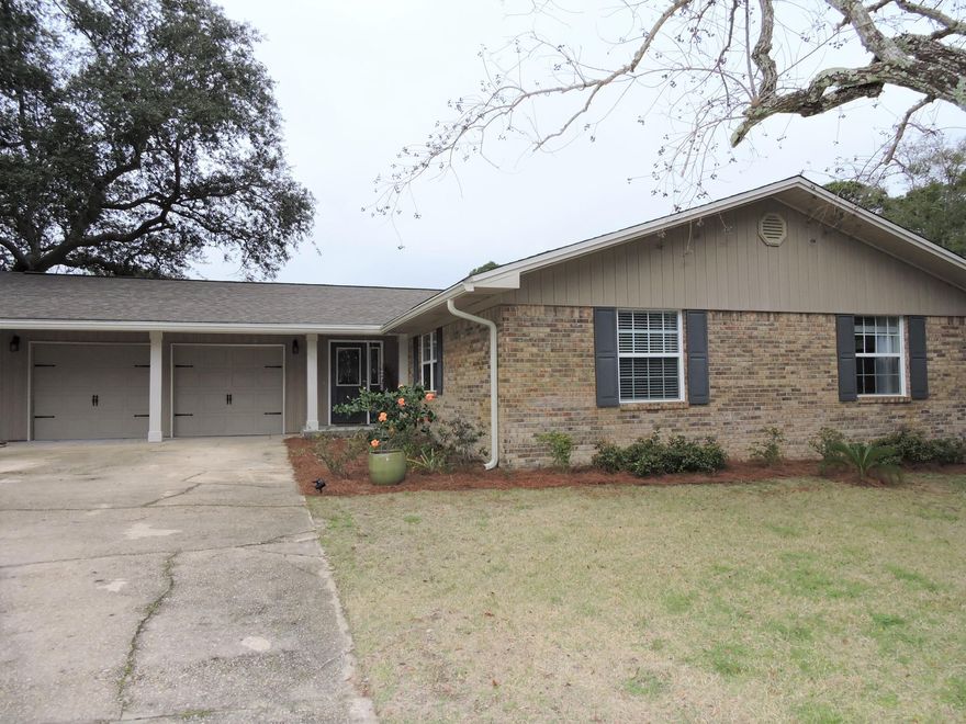 Beautiful updated home in great location! This 4 bedroom, 2 bath home is spacious and light filled. Super close to the bases, shopping, schools, and the beaches. When you walk in the front door, you will see the beautiful fireplace in the open concept great room w/laminate floors. Dining area and kitchen are a chef's dream, with granite counters, kitchen island, SS appliances, and a large pantry. The back yard is fully fenced (6' privacy) and is perfect for fun summer gatherings. Master bedroom has its own en-suite bath, walk-in closet, and tub/shower combo. The other 3 bedrooms are a good size. One of the bedrooms has a convenient pocket door to the second bath. The second bath is fully updated w/double vanities, tile flooring, and granite counters. Water heater 2016. Roof 2008