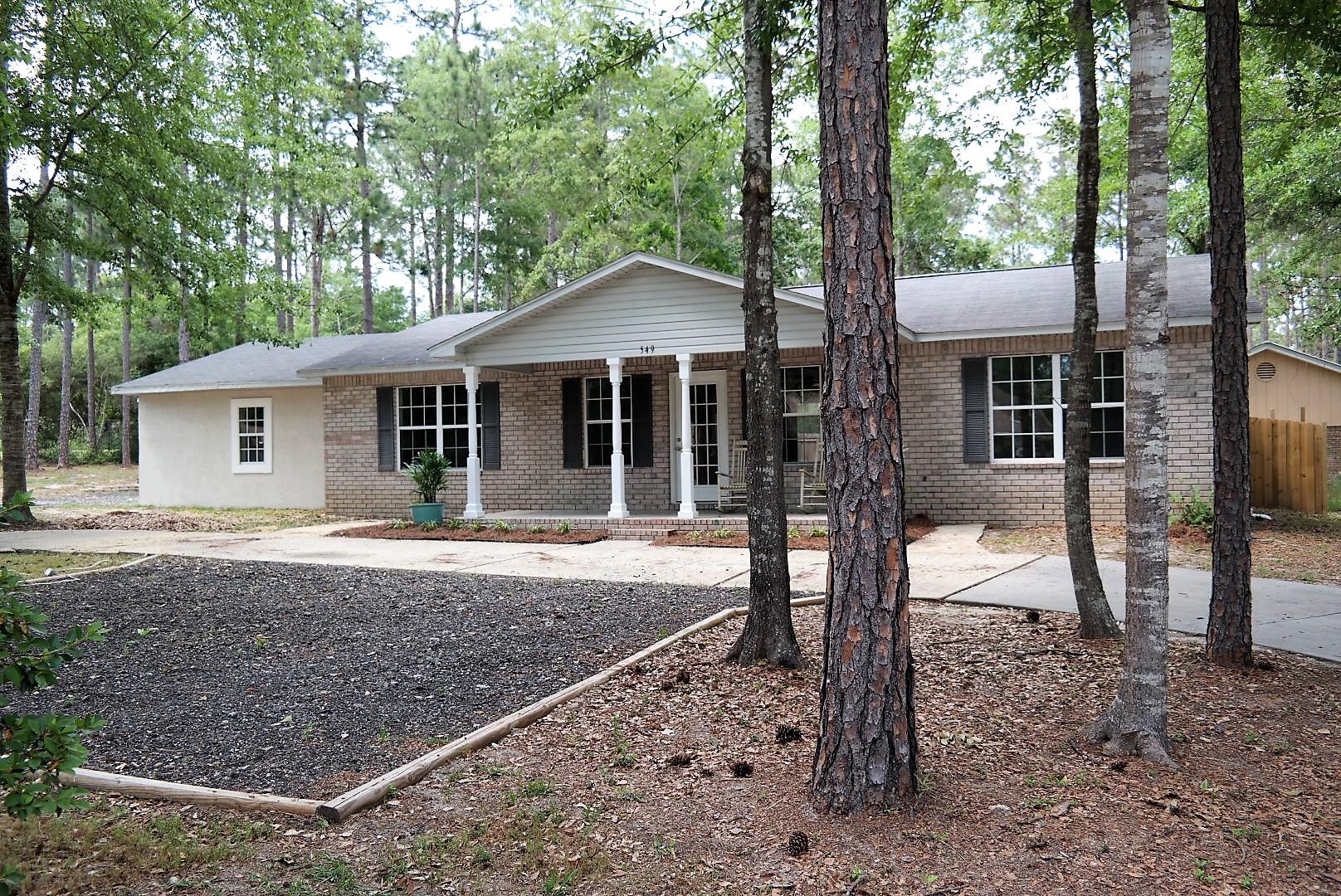 Affordable brick home in desirable Pine Shores S/D (no HOA fees). This 3 BR, 2 bath home sits on .41 acres with paved circle drive, 24x21 attached garage with additional parking area in front of home, fenced back yard, covered porch, spacious back deck and storage building. This is a split floor plan with utility room and laundry. All stainless steel appliances. This is a great neighborhood in the heart of Defuniak Springs! Schedule your showing today!