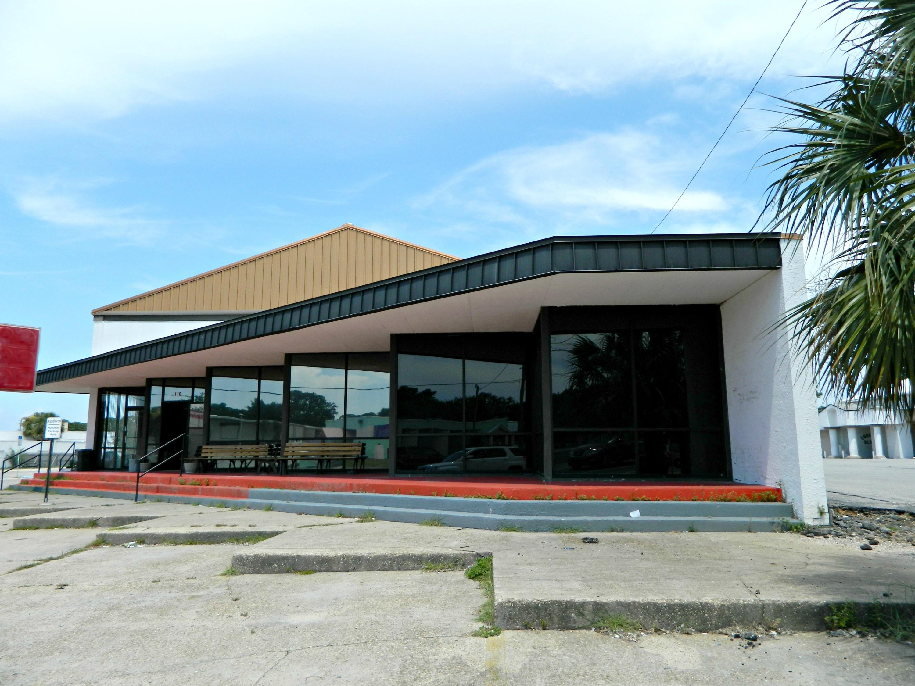 Highly Visible Commercial Property For Lease located Downtown Fort Walton Beach! There is plenty of office space, large open floor area, kitchen space with service bar, mezzanine overlooking the open floor area, several different storage areas, plus a loading dock! Great signage opportunity! Contact us for more info!