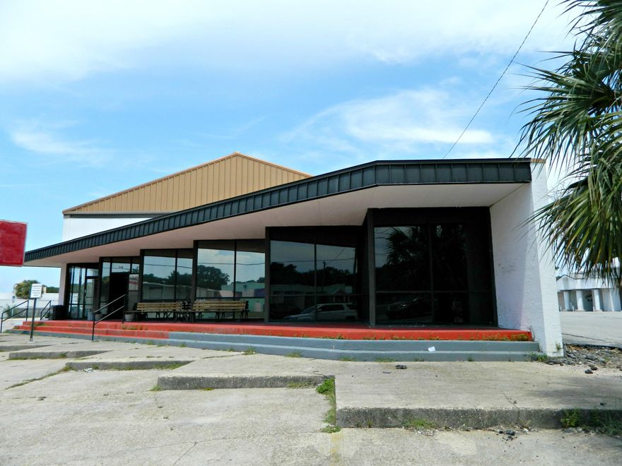 Highly Visible Commercial Property For Lease located Downtown Fort Walton Beach! There is plenty of office space, large open floor area, kitchen space with service bar, mezzanine overlooking the open floor area, several different storage areas, plus a loading dock! Great signage opportunity! Contact us for more info!