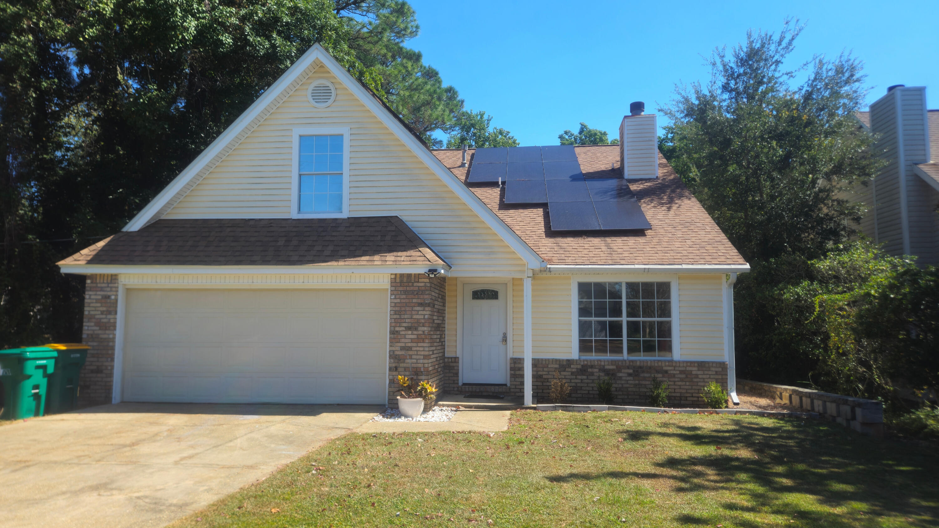 This cozy nook sits just off Highway 98 in a quiet Mary Esther neighborhood, less than 10 minutes from Hurlburt Field and under 20 minutes from Navarre's white sandy beaches. Inside, the master suite is conveniently located downstairs. The living and dining areas features wood-look luxury vinyl plank, a charming wood-burning fireplace, and modern lighting and fixtures. Upstairs, enjoy brand new, pristine carpet. Also, you don't have to worry with a 3-year-old roof and a 2-year-old HVAC system. Another big plus is that the seller will pay off solar panels at closing, so you can enjoy a minimal energy bill. VA assumable loan at 4.5% is available.