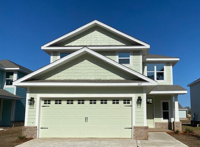 You'll love this two story with master suite on first floor! Enter thru the foyer with lots of natural light coming thru large second floor window; continue thru archway into open kitchen, living room, and 1/2 bath. Upstairs to three spacious bedrooms that share a large full bath, while the 4th upstairs bedroom (15'x15') has its own private, full bath. Granite countertops, rear covered porch (7' x 13'). CoreTec Pro Plus luxury vinyl plank flooring on entire main floor and in wet areas on 2nd floor, garage opener included, sprinkler system + well & pump included. Turn right out of Riverwalk and you are only 4 miles to the bridge that leads to the beautiful beaches of South Walton!