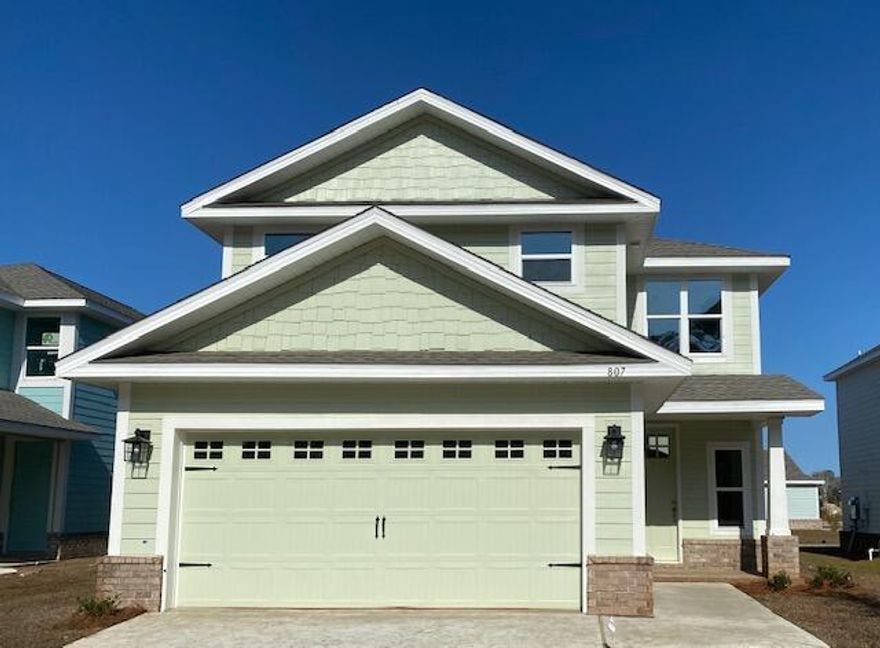 You'll love this two story with master suite on first floor! Enter thru the foyer with lots of natural light coming thru large second floor window; continue thru archway into open kitchen, living room, and 1/2 bath. Upstairs to three spacious bedrooms that share a large full bath, while the 4th upstairs bedroom (15'x15') has its own private, full bath.  Granite countertops, rear covered porch (7' x 13'). CoreTec Pro Plus luxury vinyl plank flooring on entire main floor and in wet areas on 2nd floor, garage opener included, sprinkler system + well & pump included. Turn right out of Riverwalk and you are only 4 miles to the bridge that leads to the beautiful beaches of South Walton!