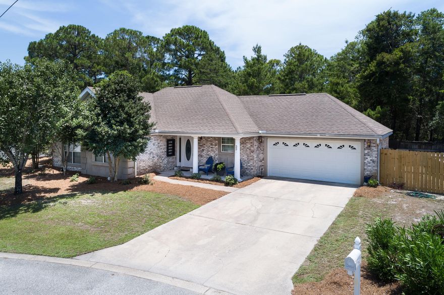 NEW ROOF to be installed! Act now and pick your shingle color! Owner is ready to sell! This is a great family home on a cul-de-sac in a fantastic location close to everything coastal living has to offer. All brick with attractive stucco accents, stylish, insurance-friendly hip roof. Nice flowing floor plan with 12' ceilings in living room, spacious dining, generous sized bedrooms. Fenced back yard with cozy brick paver patio and wooded view. Non-AC'd sun room exterior in hardi-plank, and has so many potential uses. 12 foot gate to the back yard for great outside storage. Two blocks to Choctawhatchee Bay, less than 1.5 miles to the beautiful Gulf of Mexico. Surrounded by shopping, restaurants and entertainment nearby. Priced to sell!