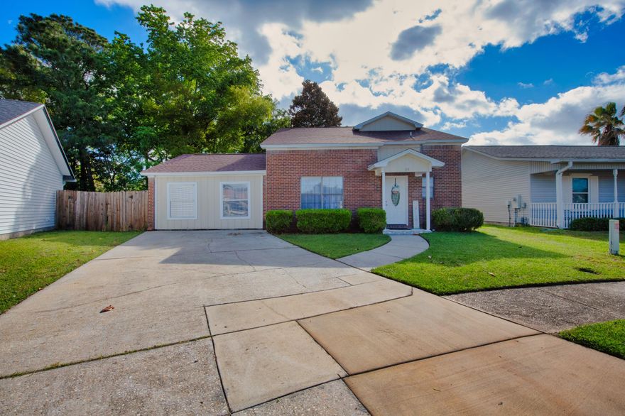 Now offering a $5000 credit with a full-price offer. Survey is complete.The exterior HVAC unit, Hot Water Heater, and Roof were all replaced in the last two years!-Check out this move-in-ready, two-story home offering the perfect blend of comfort, convenience, and recent updates!!--With four bedrooms, there is ample space for a growing family or for hosting guests. Step inside and be greeted by an abundance of natural light streaming through the windows.One of the standout features of this home is the laundry room with an exterior door leading to the spacious backyard with a privacy fence, ready for you to enjoy memorable barbecues.(Sq.Ft. to be verified by buyer- an air vent was added to the garage conversion, creating more heated/cooled area)