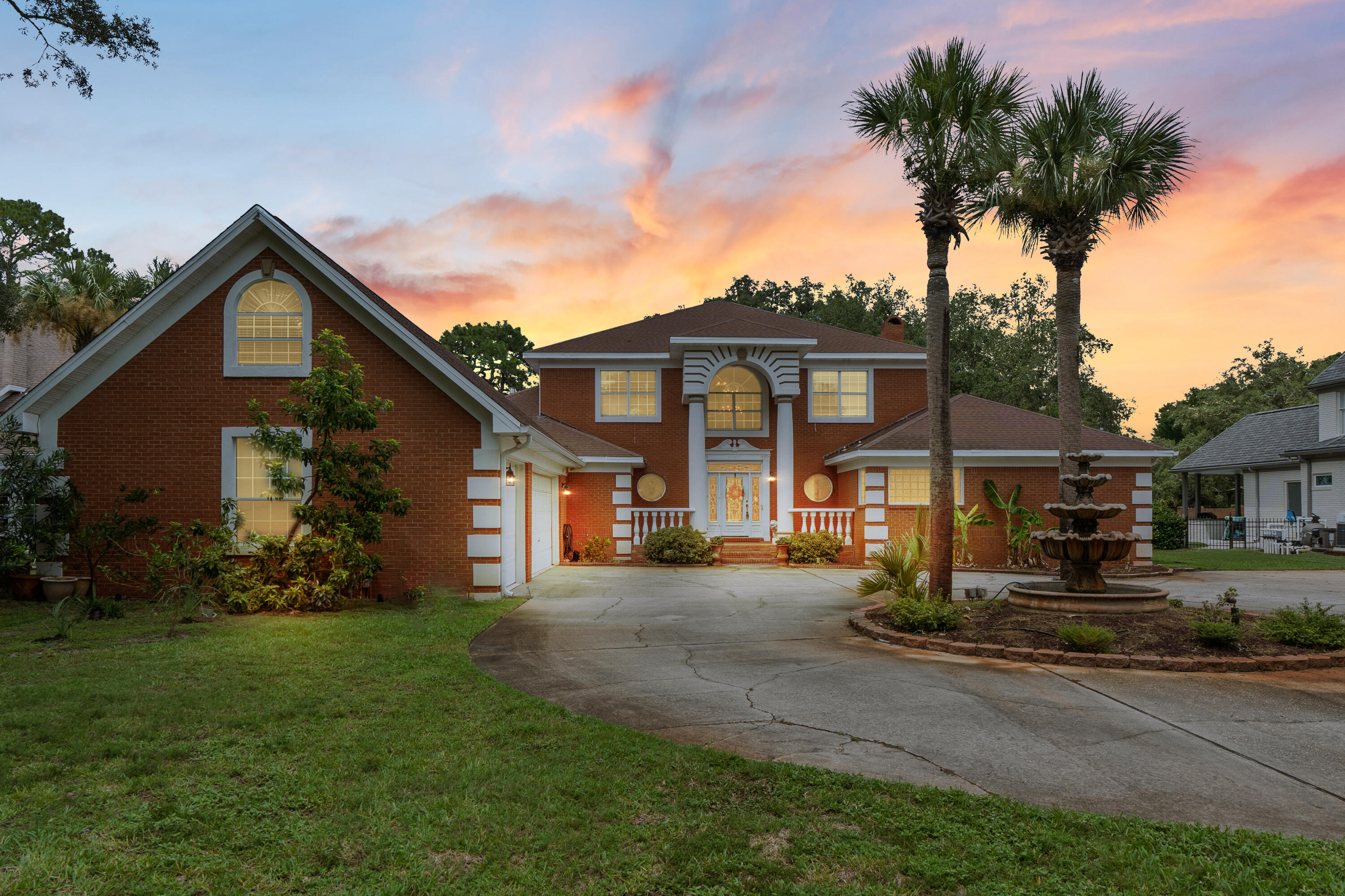 Experience waterfront living at its finest in this exquisite 5-bedroom, 4-bath home nestled in prestigious Shalimar Plantation. Boasting stunning bayou views, a private dock with boat lift, and a heated pool, this residence blends luxury with coastal charm. Inside, soaring ceilings and an inviting fireplace create a warm atmosphere, while the open floor plan offers spacious living areas perfect for entertaining. The primary suite features serene water views, direct lanai access, and a spa-like bath. Recent upgrades include energy-efficient HVAC, tankless water heater, whole-house generator, and enhanced outdoor lighting. This turnkey home offers unparalleled comfort and style in a vibrant community--your dream Florida lifestyle awaits.
