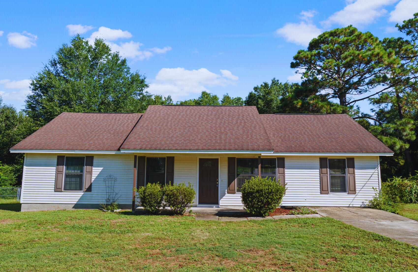 This 3 bedroom, 2 bath home with a bonus room offers 1,325 sq ft of living space on a .35-acre lot. It has been well maintained over the years and provides a solid foundation for its next chapter. Whether you're looking for a comfortable starter home or an investment opportunity with update and resale potential, this property is a great fit.This home givies you the chance to add your personal style through updates to the flooring, paint, kitchen, and baths. New water heater in 2021 and HVAC in 2015. A versatile property that's ready for your vision!