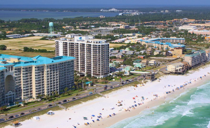 This unit is actually 2 locks out that can be rented separately or as one unit, would be great for short term or long term rental. Both sides open to a large balcony. Unit has an updated kitchen efficiency with wood cabinets, Surfside is a great rental resort with many repeat guests. Surfside has all the amenities, large heated pool, 2 hot tubs, enclosed bath house with saunas, tiki hut, large sports deck with lighted tennis courts, basketball, and shuffle board. Surfside also has a great family BBQ area with picnic tables and grills, covered parking for owners and guests and interior corridors for year round comfort. Surfside has private deeded beach access. Great restaurant ''in house'' Rick's Crab Shack, as well as massage spa and hair salon. Room dimensions are approximate and