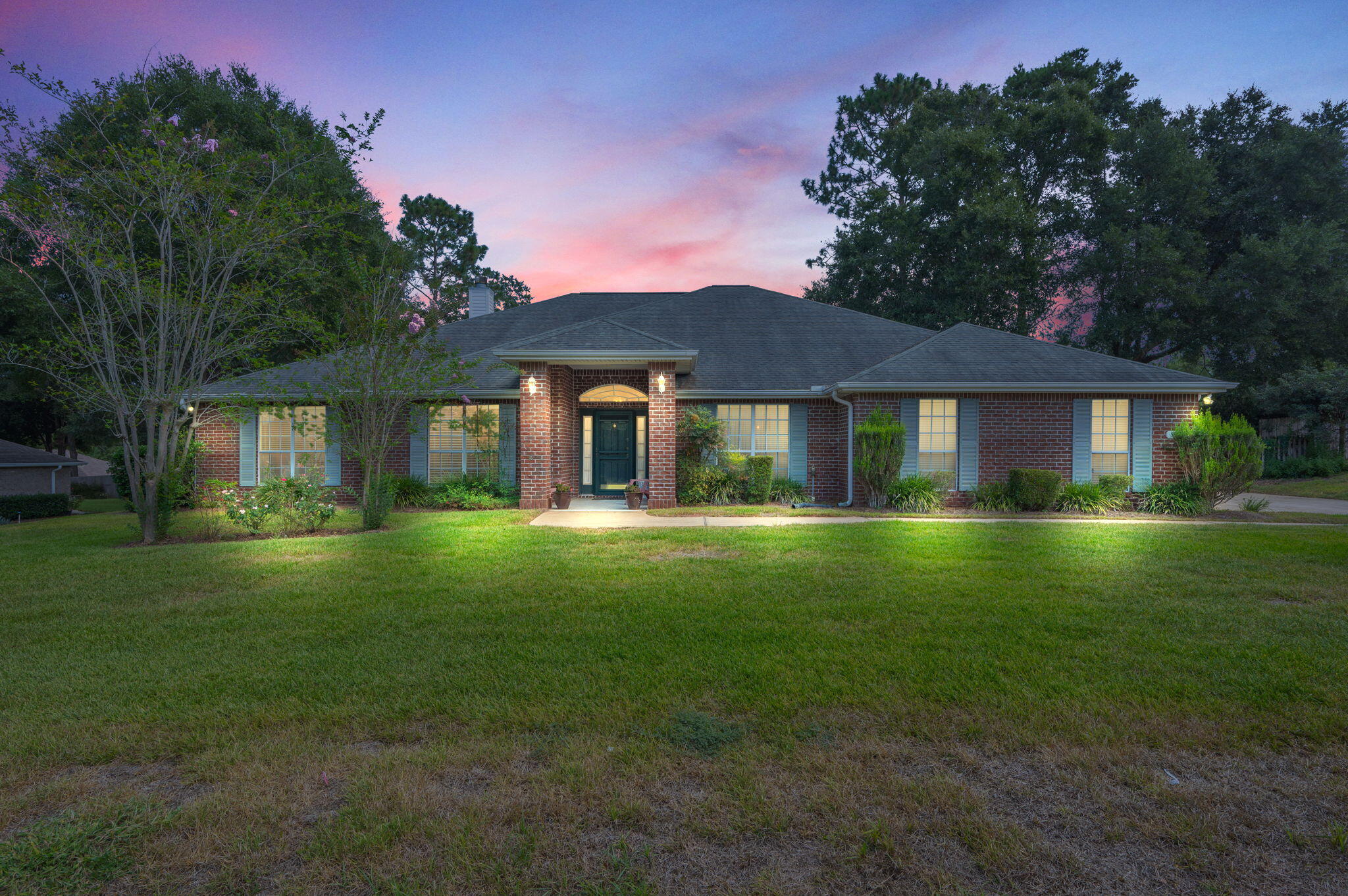 Situated in the highly sought-after Silver Oaks community, this exceptional residence is a true gem. With over 3000 sq ft of living space, the home boasts beautiful hardwood flooring throughout, except for the wet areas, which are nicely finished with tile. The spacious kitchen is equipped with a breakfast bar, island, and quartz countertops. The expansive 23x24 living room features a built-in bookcase and a gas fireplace, perfect for relaxation. The fourth bedroom serves as a second master suite, complete with its own bathroom. The expansive master suite accommodates a king-sized bed and a comfortable sitting area, ideal for reading, watching TV, or simply enjoying quiet time. The master bathroom offers a large walk-in shower and a relaxing Jacuzzi tub, perfect for unwinding after a long hard day. Look over the beautiful landscape back yard on the screen in porch. Lots of extra with the property are leaf guard and paid up termite bond. To many items to list.