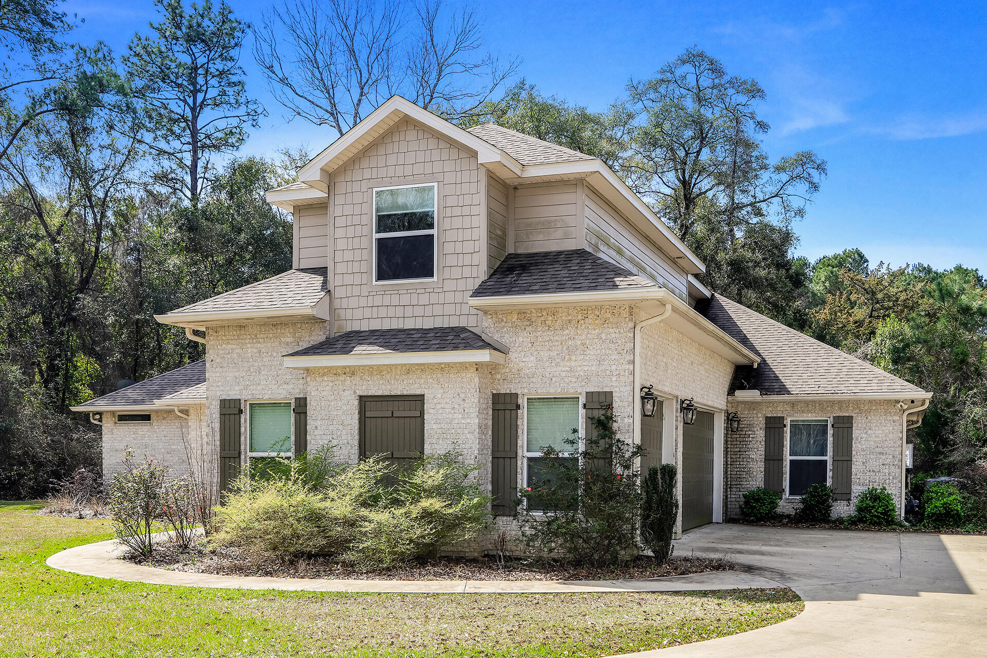 FEATURED IN 2018 PARADE OF HOMES! Quality construction.Gated community.Impressive curb appeal!5 bedrooms, 3 full baths, 3-car garage, and an amazing open floor plan! Featuring tall ceilings, an abundance of windows, 8 ft tall doors, Tankless Rinnai Gas water heater, spray foam insulation, high efficiency AC, Linear gas fireplace with floor to ceiling brick surround, 8''x 36'' wood plank ceramic tile, specialty granite counter tops throughout and intricate ceiling details throughout. The kitchen features a 36'' gas cook top, wall-mounted oven and microwave, copper double bowl apron-front farm sink, center island, glazed cabinetry, and a spacious pantry. Tongue and Groove ceiling on the covered porch... too many details to list! Great location and built to impress.