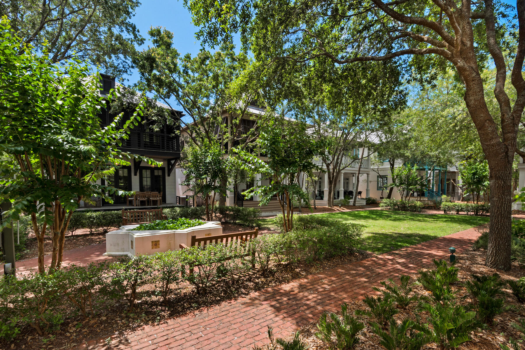 Nestled within the enchanting enclave of Rosemary Beach, 21 Dill Lane features a Cottage and Carriage House along with unrivaled opportunity for luxurious coastal living. This exceptional residence features 4 spacious bedrooms, a versatile bunk room, and 5 full bathrooms, providing abundant space for both family and guests.Upon entering, you'll be captivated by the impeccable interior design, where modern elegance seamlessly merges with the coastal charm that defines Rosemary Beach. The home is thoughtfully furnished and adorned, reflecting a commitment to luxury living that exudes sophistication and relaxation.One of the home's outstanding features is the enchanting courtyard, complete with a stucco fireplace--a place where you can envision cozy evenings spent gather