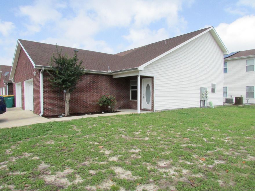 SELLER TO CREDIT BUYER $5,000 TOWARD CLOSING COSTS!  This updated end unit 3 bedroom/2 bath Quail Run townhome has a new roof, new stainless steel kitchen appliances, new carpet, new toilets, and large diagonal tile flooring. Vaulted ceiling in living area. Master bedroom is on the first floor.  Spacious rooms and large storage under staircase. Oversized one car garage and two oversized parking spaces. Quail Run has a community pool area with bathrooms. Quarterly association fees ($370/quarter) includes trash service, groundskeeping and outside pest control.  Association allows for primary residence or long term investment (rentals average $2250 to $2500 per month).  Townhome is centrally located and near shopping, restaurants and the beaches of the Gulf of America. Sold AS IS.