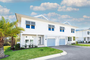 Welcome to Century 393, the newest and most exciting townhome development in Santa Rosa Beach, Florida. Perfectly positioned at 520 S Co Hwy 393, this exclusive community offers unparalleled access to 30A's best just a three-minute golf cart ride to Ed Walline Beach, Shunk Gulley, Papa Surf Burger Bar, and the lively Gulf Place town center. Unit #19B boasts 1,914 square feet of heated and cooled living space, with 2,412 square feet under roof. Designed for modern coastal living, this three-bedroom, four-and-a-half-bath townhome features a versatile bunk room, high-end finishes, an outdoor kitchen, and a fully fenced backyard making it an ideal personal retreat.The open-concept first floor seamlessly connects the living, dining, and kitchen areas, with ample natural light enhancing the coastal elegance. A walk-in pantry, laundry room, powder bath, and one-car garage complete the main level.
Upstairs, the spacious primary suite boasts a dual vanity and walk-in shower, while both guest bedrooms each feature their own private ensuite baths. The additional bunk room offers flexibility as an office or extra sleeping area, complemented by a hall bath with a double vanity and tub/shower combo. Every home in this exclusive community enjoys an outdoor kitchen and a fenced backyard for private entertaining. A dedicated ice machine in the garage makes beach days effortless. This marks the first completed phase, with future expansion on an adjacent 10 acres set to introduce a stunning community pool, sun deck, and cabana. Don't miss your chance to rent in this premier up and coming development along 30A.