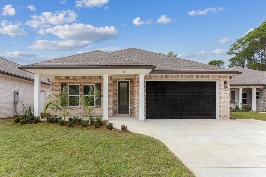 Discover exceptional craftsmanship with modern comfort in this brand new 3 bedroom, 2 bath all brick open concept home offering 1,905 sq.ft of thoughtfully designed, single-level living. This home blends timeless quality with today's most desired features, creating a home that is as functional as it is beautiful. Step through the door into an oversized foyer that immediately sets the tone for the custom finishes found throughout. Durable LVP flooring spans the entire home, paired with crown molding in main areas for a polished, seamless aesthetic. Walk into a spacious living room that features an open layout with abundant natural light and a comfortable welcoming design. Neutral finishes, modern lighting, and large windows make it perfect for both everyday living and family gatherings. The kitchen is a true showpiece, featuring maple shaker cabinetry with soft-close doors & drawers, a farmhouse sink, quartz countertops, stainless steel Whirlpool appliance package, and a huge pantry. A massive 8ft island and a 6ft coffee bar finishes out the space perfect for entertaining! Make your way into the primary suite with generous space, natural light and a custom tray lighted ceiling. The on-suite spa like bathroom adorned with shiplap includes a 6ft soaking tub and huge walk in shower. A dream custom built primary closet makes organization easy. Two more bedrooms and a full bath provide comfort and long term value. Step outside to a huge private lot, 8-ft privacy fence with a double back-gate entrance, ideal for storing boats, trailers, ATVs, or creating your outdoor workshop area. Enjoy multiple outdoor living spaces including a screened in back porch for year-round relaxation and an open brick patio perfect for grilling and entertaining! This home truly checks all the boxes, with premium materials, custom details, energy efficient construction, upgraded spray foam in the roof, and a huge garage with pull down stairs to access extra storage. Don't Wait! Take advantage of generous incentives- Builder is offering $10,000 toward buyer's closing costs AND is covering doc stamps, title insurance, all standard title fees, one year builder's warranty and final survey! Don't miss your chance to make this beautiful home yours today! Welcome Home!!
   