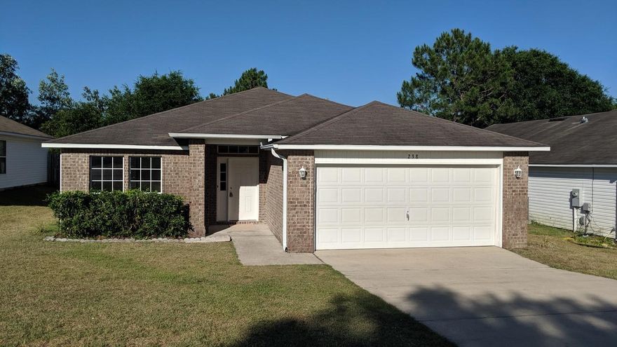 Great 3 bedroom and 2 bath home located in South east Crestview close to elementary and middle schools, hospital, shopping and banking. Open floor plan that opens up to large family room great for entertaining and with kitchen featuring a serving/sitting breakfast bar, plenty of cabinets, smooth top stove, refrigerator with ice and water in door, microwave and dishwasher. Large Master bedroom and the Master bath is spacious as well. Master bath has separate shower and garden tub with large walk-in closets. Fresh paint throughout home and new carpet just installed. The home is ready to move in! Come and look today!