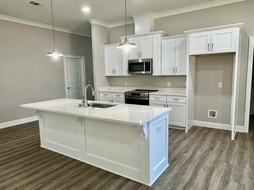 NEW CRAFTSMAN Custom Built Home ~ this luxurious 3 bed/2 bath floor plan is under construction ,end home of 4 new builds and will be ready in time for your Spring  move in ~Great Central Location with easy access to Navarre Beach, Navarre Waterfront Park and Hwy 98 to Hurlburt Field AFB.This Stunning Robbins Builders Home offers trend setting features~Greeted by a walk in foyer sweeping through to your open floor plan ~Large kitchen enjoying custom cabinets with crown molding, beautiful granite counter tops~under mount sink~S/S appliances, large double door pantry  & closed off utility room ~sleek top center Island with pendant lights ~open flow to the family room with patio doors out to the large covered porch .Wood look LVP throughout  with tiled bathrooms~ Large master with trey ceiling /ceiling fan and large walk-in closet ~master bath offers an oversized TILED shower ~ double vanity with picture frame mirrors. Additional Bedrooms are a great size with double closets and ceiling fans~Home has a welcoming covered front porch and large covered back porch to sit out and enjoy those wonderful Florida evenings ~great to cook out and entertain. Grassed yard with irrigation system for easy care in the summer months. TAEXX in wall pest control system~ Hurricane protection for windows and dimensional shingle roof for lower insurance premium. Upgrades throughout include recessed lighting, bedroom fans, crown molding, deluxe lighting package,50 Gallon water heater, garage door remotes, attic drop down stairs~ to name a few.....Call today for further information.