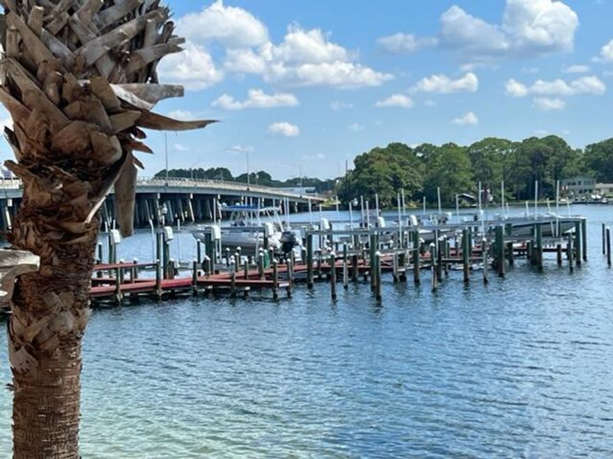 Water views from your balcony of Cinco Bayou.   Spacious 2 bed, 2 bath condo.  Primary bedroom has en-suite bath with double vanities brand new luxury vinyl plank flooring recently installed.  Splash in the community pool while watching the boaters go by. Perfect roommate floor plan with tons of closet space and oversized laundry room.  Enjoy the peace and quiet of no short term rentals. Buyer to verify any information deemed important.  More pictures may be available after tenants vacate the unit.