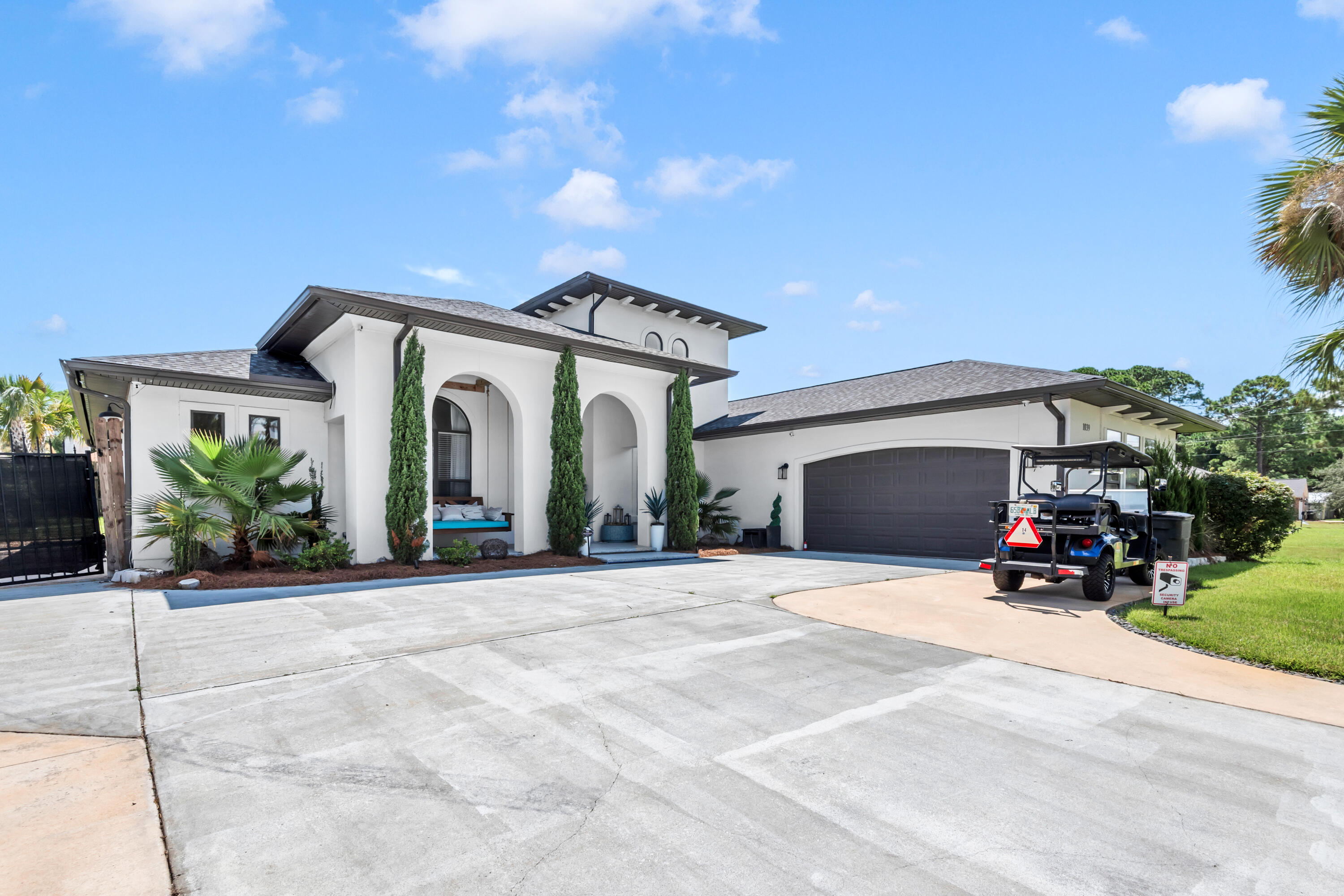 Welcome to your completely remodeled oasis at 1039 Forest Shore Dr, Miramar Beach, FL. This stunning home has been meticulously updated with over $200,000 in interior renovations, offering a perfect blend of luxury and comfort. From the moment you arrive, you'll be captivated by the home's curb appeal, featuring an oversized driveway, an RV pad with a gate, and beautiful landscape and roofline lighting.Step inside and be greeted by soaring vaulted ceilings and elegant 8-foot doors that enhance the sense of space and grandeur. Top-of-the-line Cali Bamboo LVP flooring flows seamlessly throughout the open-concept living space. The gourmet kitchen is a chef's dream, boasting high-end appliances and exquisite Quartzite countertops. LED lighting and high-end fixtures illuminate every corner of this magnificent home, creating an inviting and sophisticated ambiance.
The master suite is a true retreat, offering a luxurious walk-in shower, a serene soaking tub, and an electric fireplace to create the perfect mood for relaxation. With a new roof, a 2023 AC unit, a new tankless water heater, and a new irrigation system, this home is as efficient as it is beautiful.
Enjoy the ultimate outdoor living experience in your private backyard sanctuary. A 12-foot privacy fence encloses a space featuring a jacuzzi, an outdoor firepit area, and a porch with Ninja coating for durability. A home camera security system provides peace of mind, allowing you to fully enjoy your slice of paradise.
Located just 2 miles from the pristine beaches of Miramar Beach, less than half a mile from the bay and a nearby park, and only 1.5 miles from a convenient boat launch, this home offers an unparalleled coastal lifestyle.
As an added incentive, the seller is offering a 6-seater golf cart, $10,000 in closing costs, or $10,000 towards a rate buy-down with an acceptable offer. Don't miss your chance to own this turnkey, resort-style home. Schedule your private showing today and experience the best of Florida living!