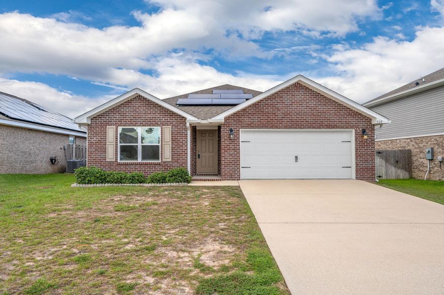 SOLAR PANELS PAID OFF! This Stunning Cali floor plan in the desirable Redstone Commons community offers a spacious open-concept design, the kitchen features a large granite countertops, and stainless-steel appliances, all flowing seamlessly into the bright and airy great room. From here, you'll have easy access to the covered screened back porch. The private Owner's Suite is tucked away at the rear of the home, with the bath having dual sinks, and a large 5' shower. Additional highlight of this home is the Paid-off solar panels, providing low utility bills from day one. Community amenities such as a resort-style pool, clubhouse gazebo, dog park, and playground.  Convenient location with quick access to local bases. This home is truly move-in ready, modern features, comfort, and efficiency