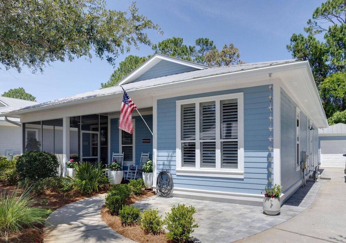 BEAUTIFUL COASTAL BEACH COTTAGE! Located in the Tree Lined Crystal Lake Neighboorhood, in the Sandestin Golf & Beach Resort. Enjoy the lush landscaping, relaxing front porch, or entertaining on the large back patio. All Landscaping included in the Hoa. 3BR & 2BA with highly sought avfter GARAGE & Golf Cart Parking! Kitchen transformation to include All Kitchen Aid Professional Series Stainless Appliances. Mobile Island with seating. Custom Built Solid Oak pull-out storage & pantry. Updated LG stackable laundry system. Primary Suite  includes huge custom built walk in closet with specialty storage. Updated Ensuite bath with quartz countertops and glass enclosed shower with decorator tile. Updated Luxury Vinyl Flooring throughout living areas and updated tile in flooring in Bathrooms Plantation Shutters on all windows and doors, all newly installed LED recesed lighting as well as all Decora lighting recepticles. Privacy Fencing installed to enclose the back paved patio that has been transformed with lush landscaping. Gutters installed and the interior and exterior of the home have been recently painted in a charming coastal pallet.  Oversized single car garage with bonus storage room with access into the fenced in back patio. HVAC Replaced in 2013, hot water heater replaced in 2015. The HOA dues include all landscaping, pest control, Termite Bait Stations, Basic Cable, and Trash Pickup. Crystal Lake does not allow weekly rentals. Full list of Upgrades Available in Documents.